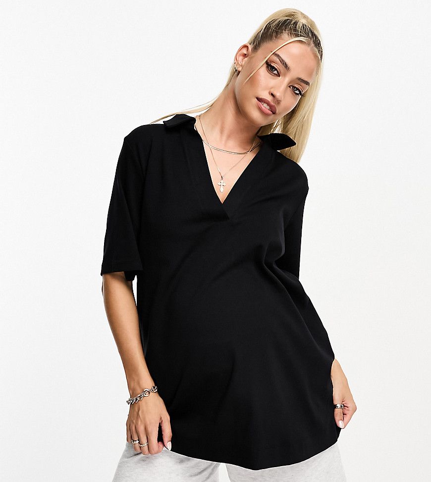 ASOS DESIGN Maternity - Camicia comoda stile polo nera con profondo scollo a V - ASOS Maternity - Modalova