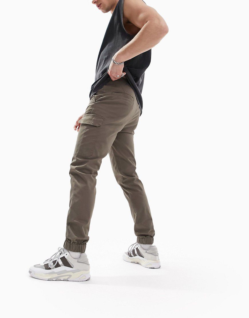 Pantaloni cargo skinny con fondo elasticizzato kaki - ASOS DESIGN - Modalova
