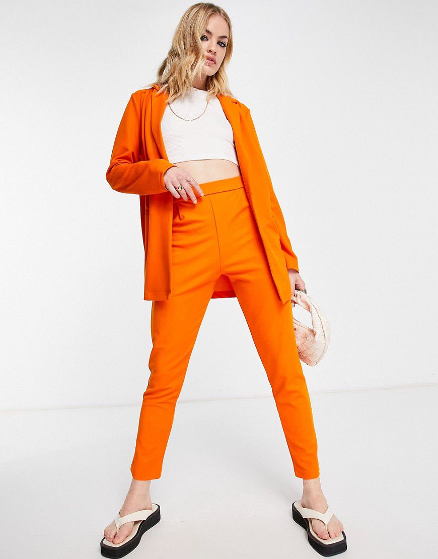 Pantaloni da abito affusolati in jersey arancioni - ASOS DESIGN - Modalova