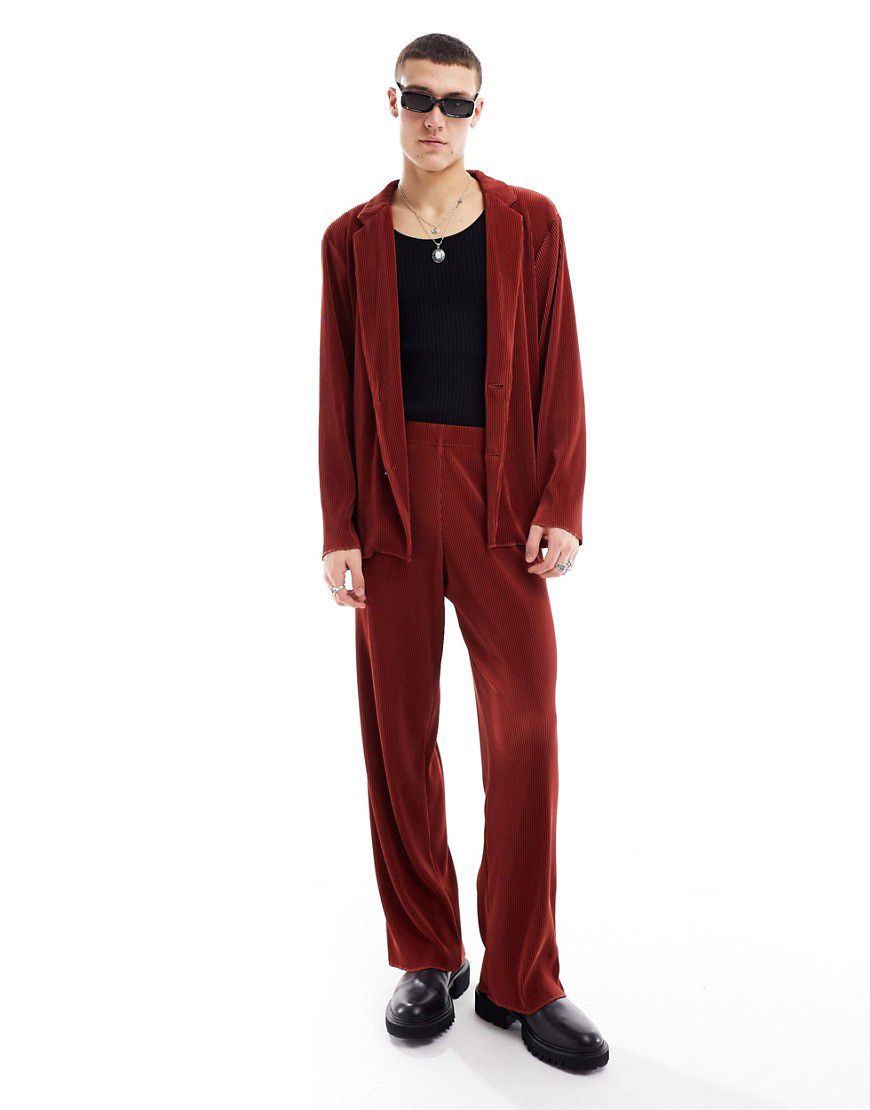 Pantaloni da abito plissé ampi color rosso - ASOS DESIGN - Modalova
