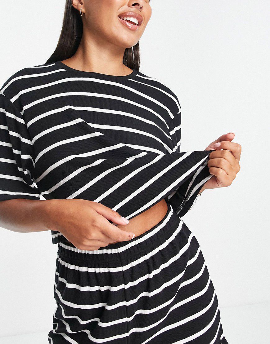 T-shirt del pigiama mix & match a coste nera con righe bianche - ASOS DESIGN - Modalova
