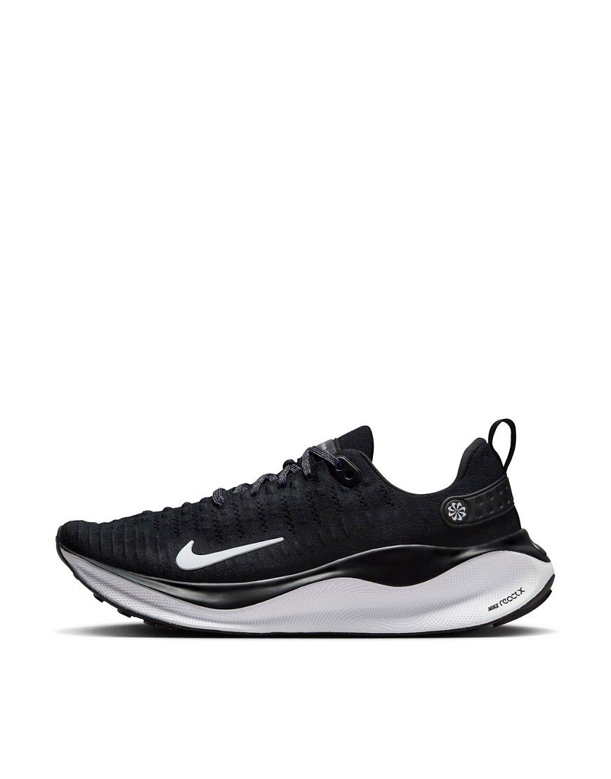 Nike - React Infinity Run Flyknit 4 - Sneakers nere e bianche a pianta larga - Nike Running - Modalova