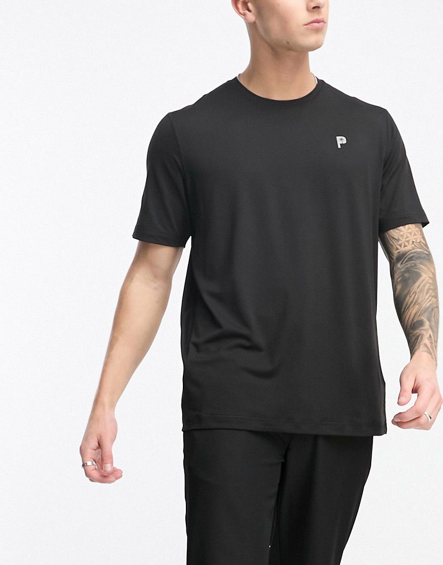 Puma - Golf x PTC - T-shirt nera con logo - Puma Golf - Modalova