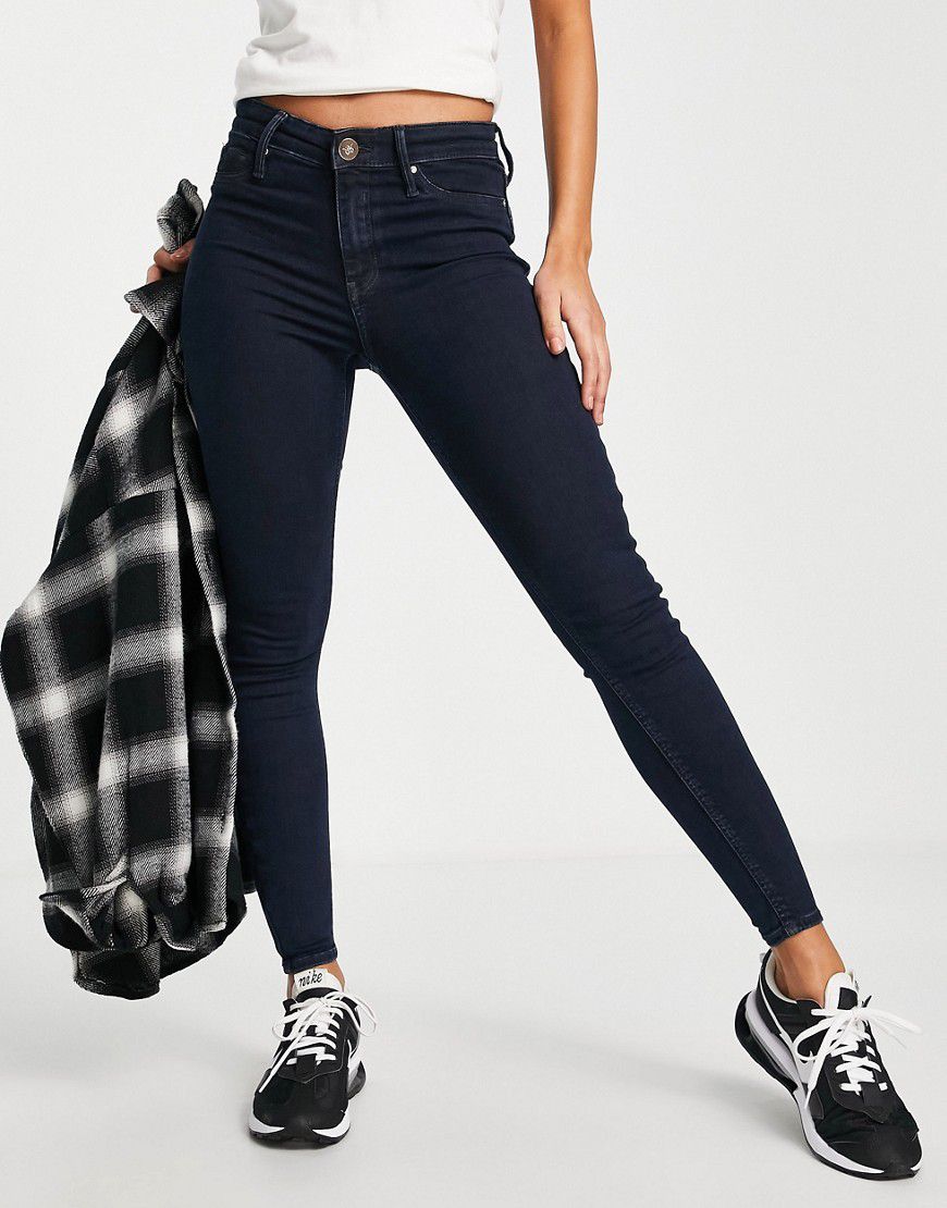 Molly - Jeans skinny a vita medio alta modellanti indaco scuro - River Island - Modalova