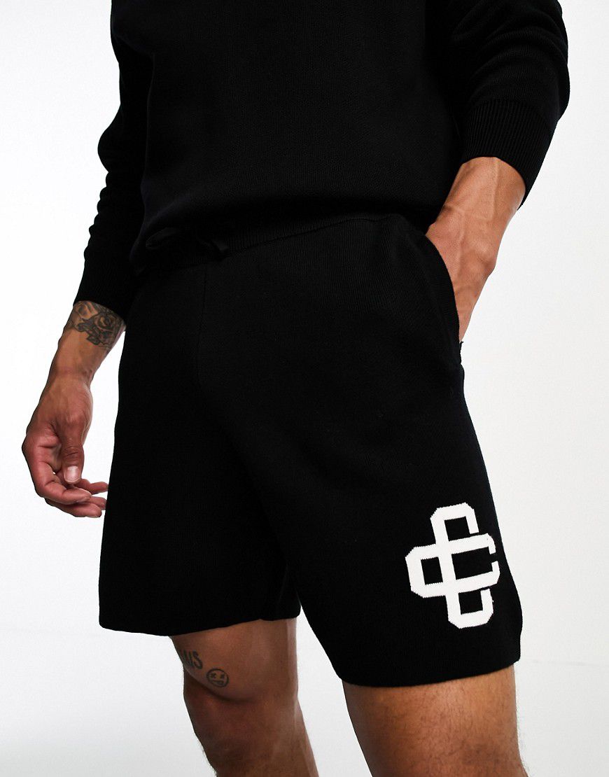 Pantaloncini in maglia neri con logo in coordinato - The Couture Club - Modalova